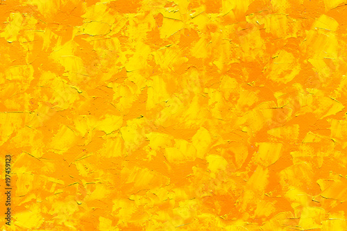 Seamless abstract yellow and orange oil paint texture on canvas