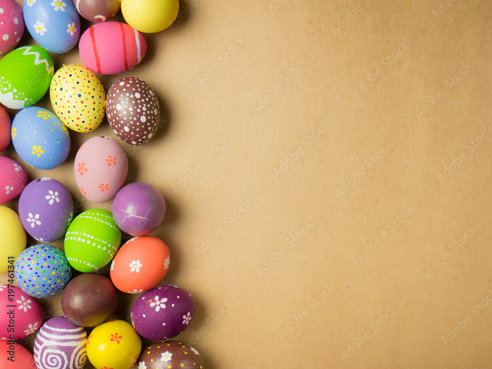 Easter eggs on the brown background.