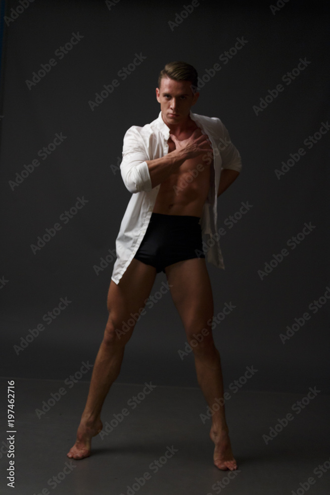 © Skripnik Olga - men is dances in a black pants © Skripnik Olga - men is dances in a black pants