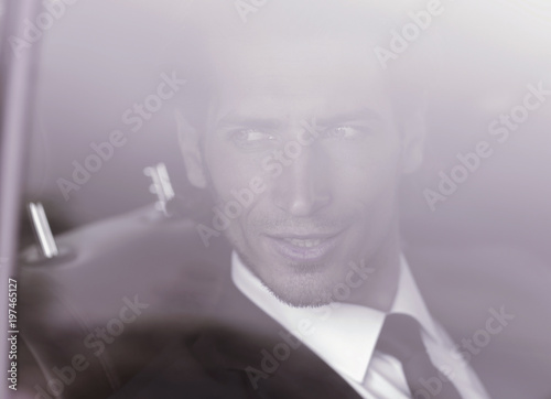 background image of the businessman in the car