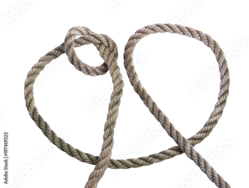 Old coil of rope on a white background