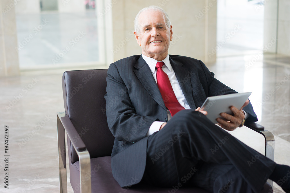 Portrait of happy senior businessman with touchpad Portrait of happy senior businessman with touchpad