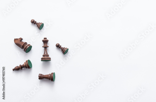 Chess game figures on white background , top view, flat lay copy space