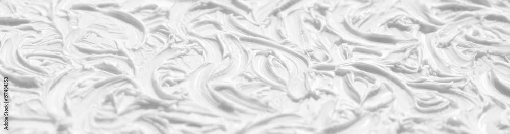Naklejka premium A beautiful white background is painted with paint with the help of brushes. Texture surface with patterns and strokes, pattern for wallpaper.