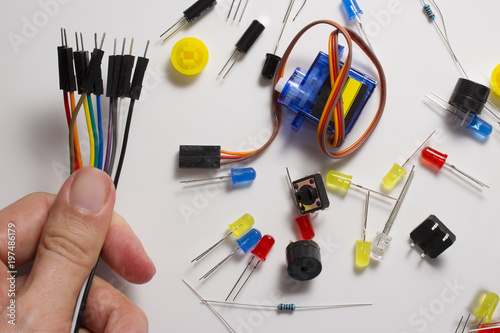 Color LEDs, buttons and wires, electronics for device design