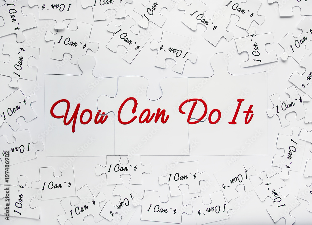 You can do it. Words of motivation. Concept motivational message of ability and possibility. I can`t and you can are written on puzzle pieces. You can do it. Words of motivation. Concept motivational message of ability and possibility. I can`t and you can are written on puzzle pieces.