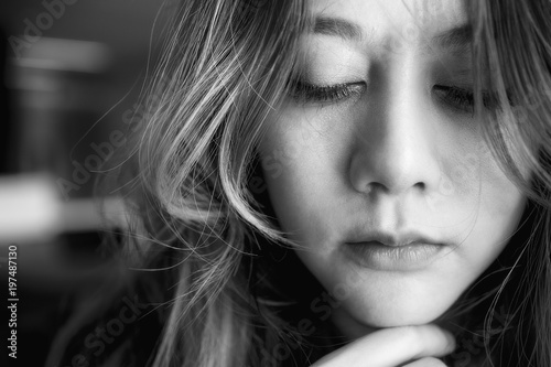 Concept emotional person anguish young beauty girl depressed sad black and white.
