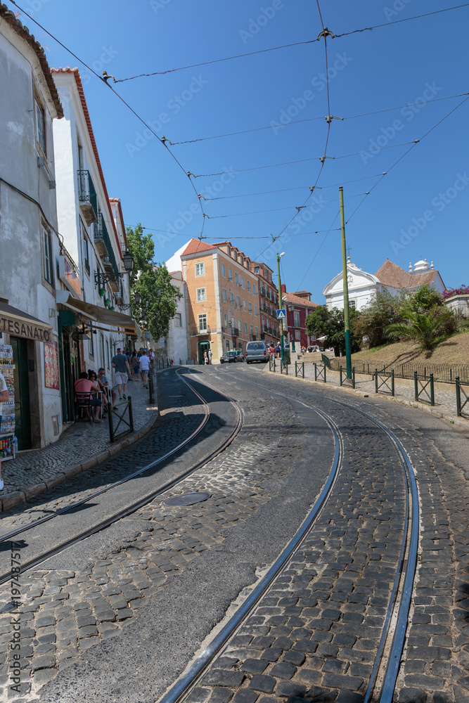 Street in Lisbon with Tracks and Cables for Tram Transportation, Portugal