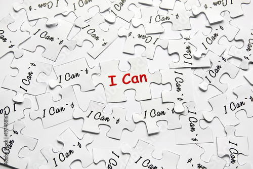 I can. Words of motivation. Concept motivational message of ability and possibility. I can t and i can are written on puzzle pieces.