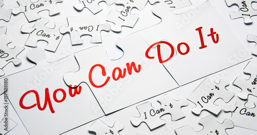 You can do it. Words of motivation. Concept motivational message of ability and possibility. I can`t and you can are written on puzzle pieces.