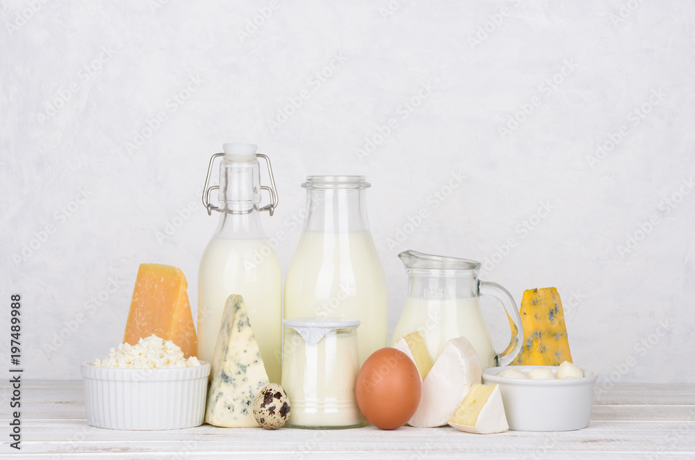 Dairy products on white wooden table