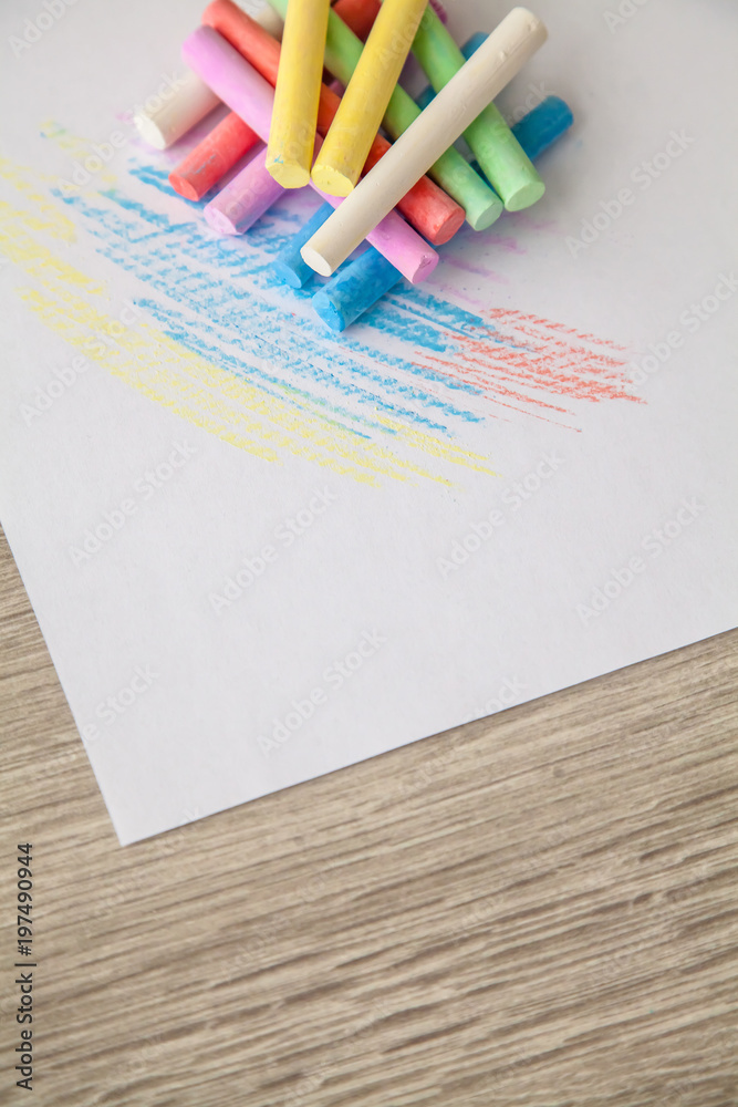 Obraz premium Colorful multi-colored chalk on a white background.