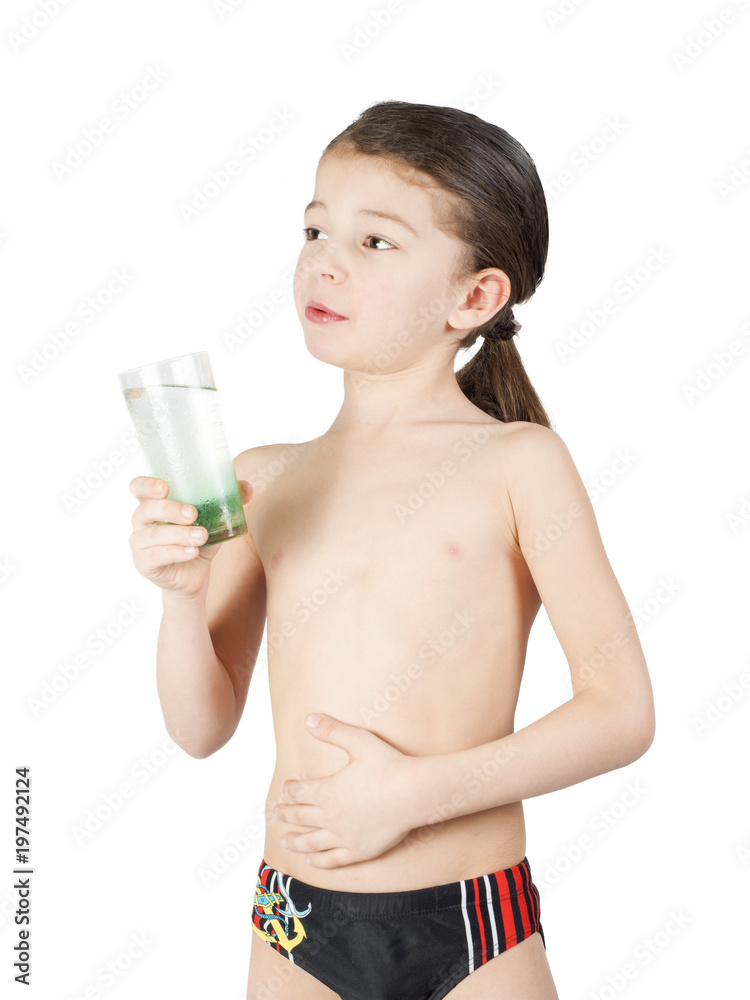 Beautiful little boy alone drinking water from glass, isolated on white Beautiful little boy alone drinking water from glass, isolated on white