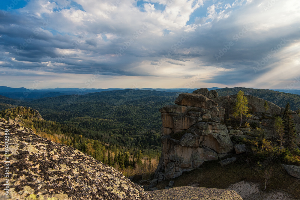 Beauty view in mountains of Altai. Kolyvan range - a mountain range in the north-west of the Altai Mountains, in the Altai Territory of Russia Beauty view in mountains of Altai. Kolyvan range - a mountain range in the north-west of the Altai Mountains, in the Altai Territory of Russia