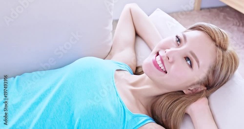 woman lying on sofa photo