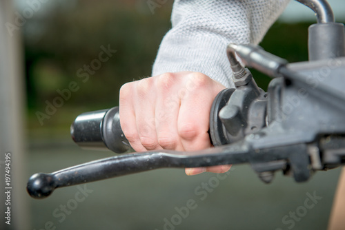 driving a motorcycle without gloves