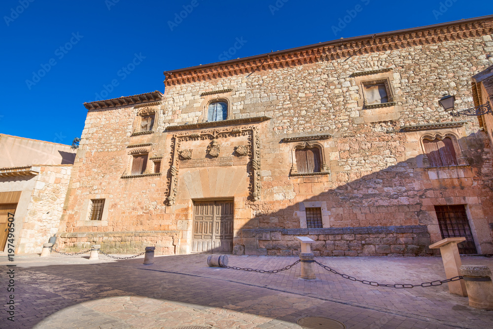 exterior facade of Palace Contreras, landmark and public monument of fifteenth century, in old town of Ayllon village, Segovia, Spain, Europe
