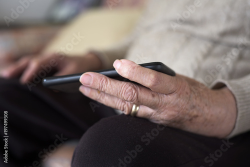 old woman using a smartphone