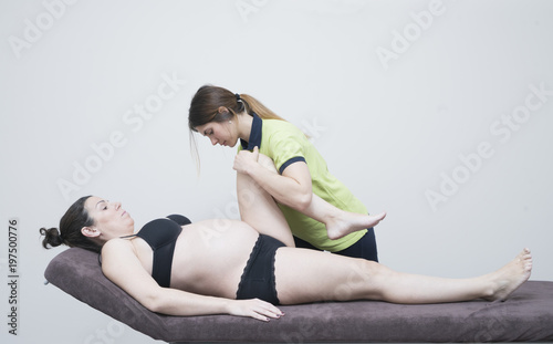 Pregnant woman at the physiotherapist