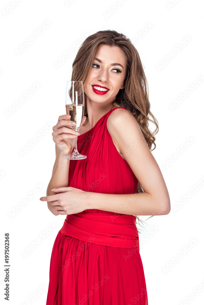attractive cheerful girl in red dress with champagne glass, isolated on white