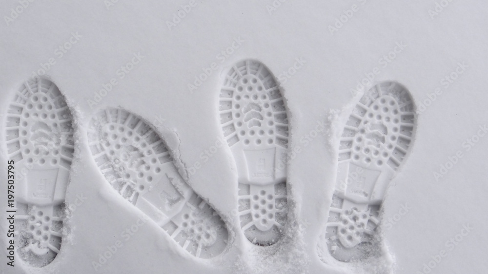 Footprints in the snow. Footprints in the snow.