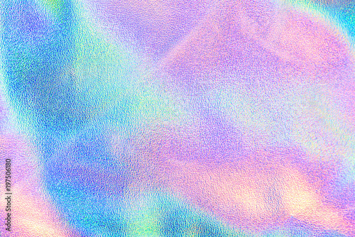 Holographic real texture in blue pink green colors with scratches and irregularities