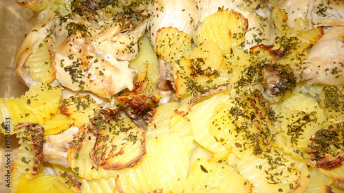 Potatoes baked with chicken.