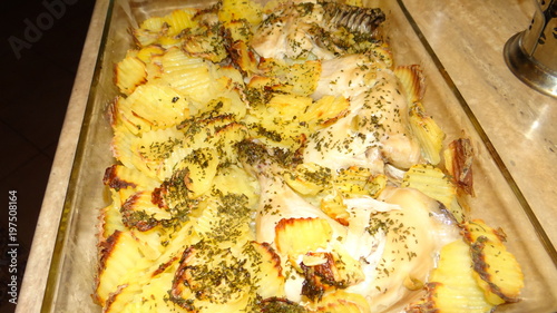 Potatoes baked with chicken.