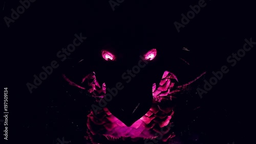 Dragon made of metal in dark room
