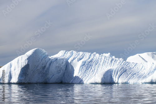 Giant Icebergs of Illulisat, Greenland, floating on water, a popular cruise destination
