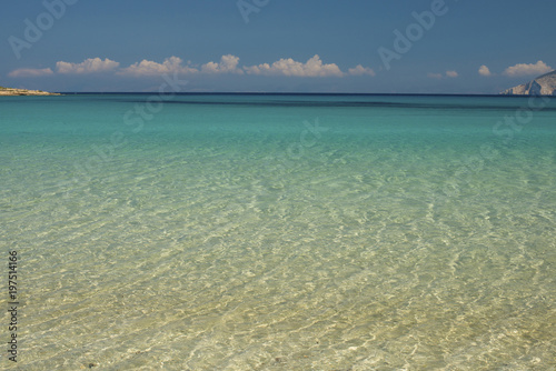 Crystal clear waters of Pori beach at Koufonisi island in Greece