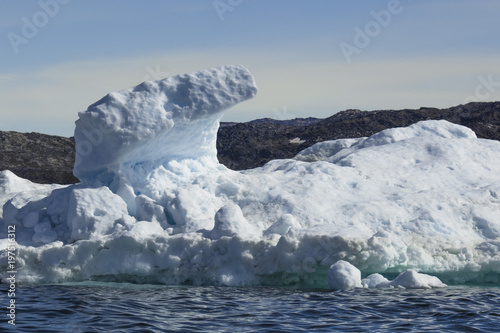 Giant Icebergs of Illulisat, Greenland, floating on water, a popular cruise destination