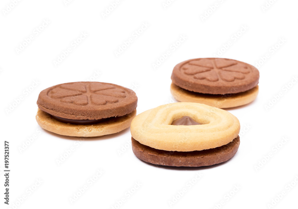 Chocolate heart in round biscuit isolated on white background Chocolate heart in round biscuit isolated on white background