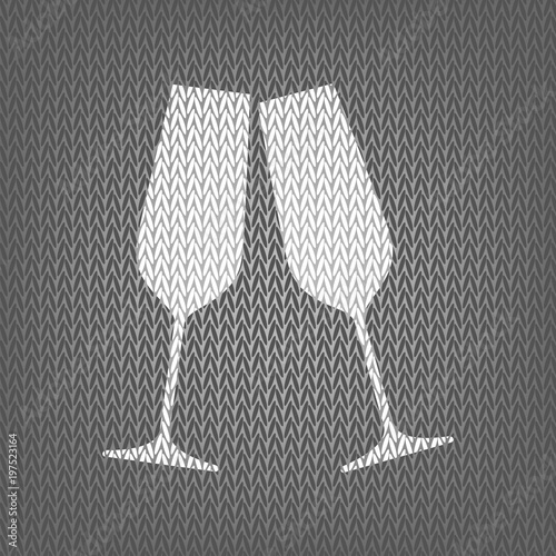 Sparkling champagne glasses. Vector. White knitted icon on gray 