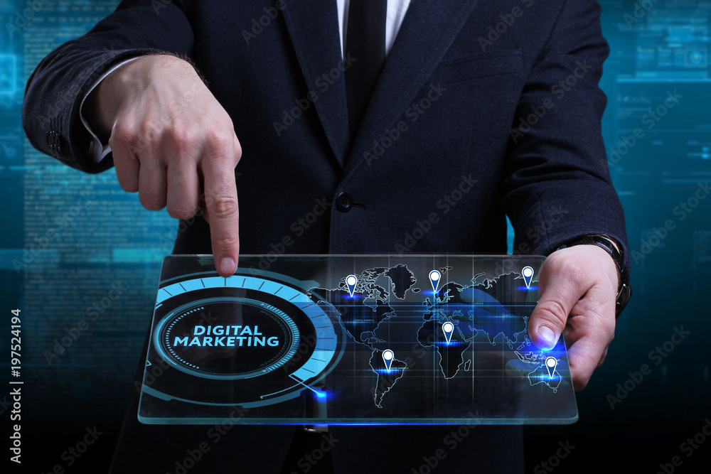 Business, Technology, Internet and network concept. Young businessman working on a virtual screen of the future and sees the inscription: Digital Marketing