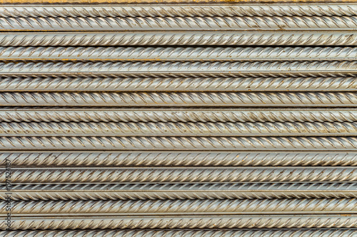 Steel reinforcing bars rods with periodic profile. Industrial abstract background.