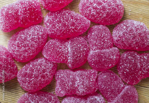 jelly candy, pink marmalade in sugar, closeup photo