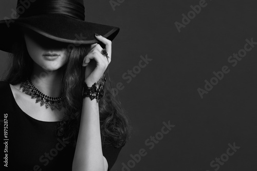 Young beautiful elegant woman in a hat. Retro style