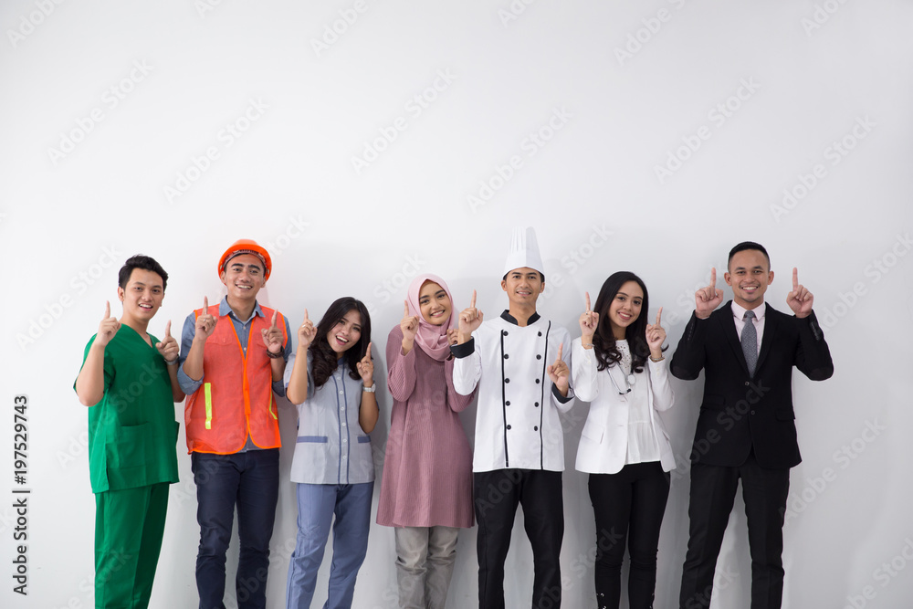 Obraz premium Portrait of various professions pointing up