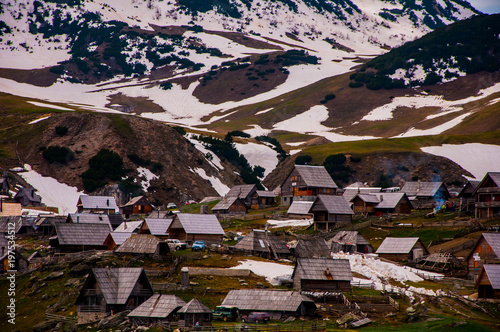 Small houses on the coast of the Prokosko lake photo