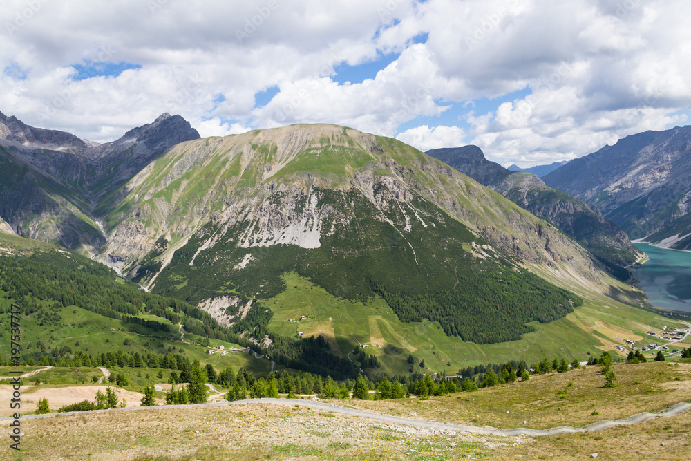 Beautiful summer landscape with Monte Motto and Lake Livigno, Italy Beautiful summer landscape with Monte Motto and Lake Livigno, Italy