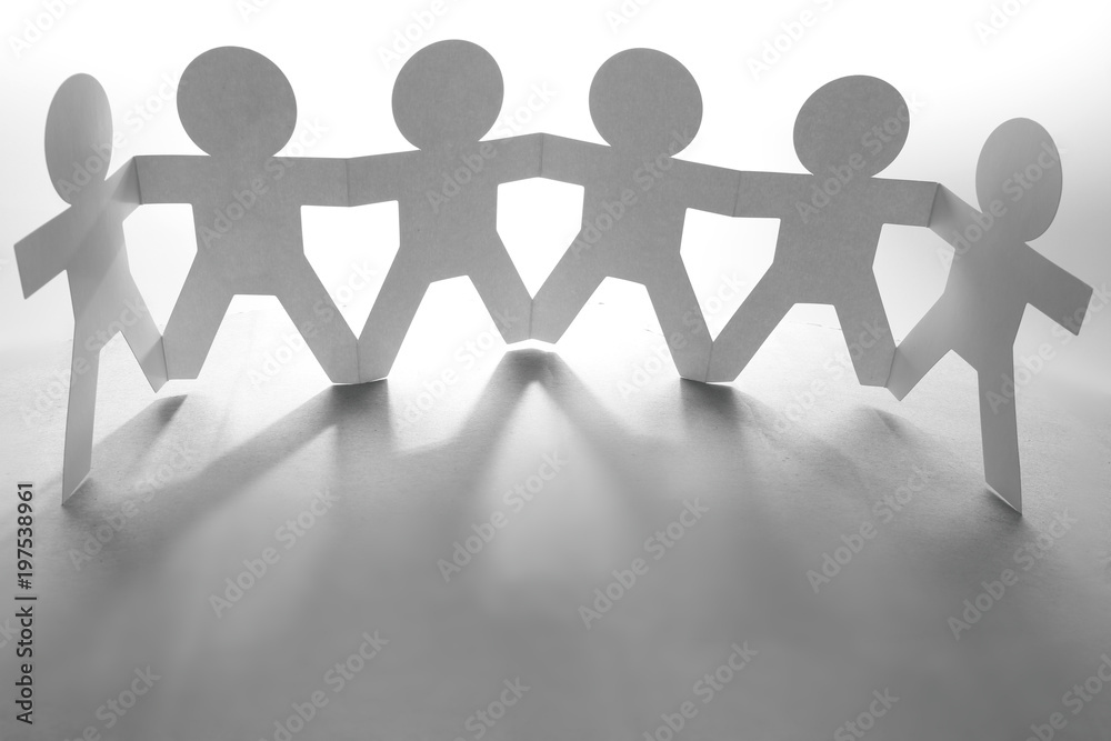Paper chain team holding hands Paper chain team holding hands