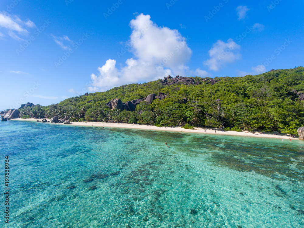 Fototapeta premium Coastline of La Digue Island, Seychelles aerial view