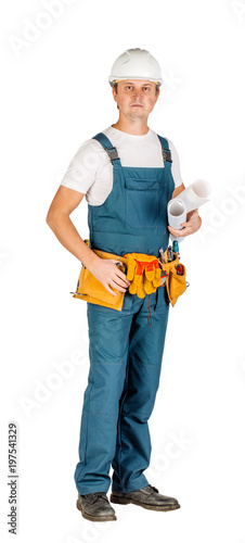 male builder or manual worker in helmet over white wall background. repair, construction, building, people and maintenance concept