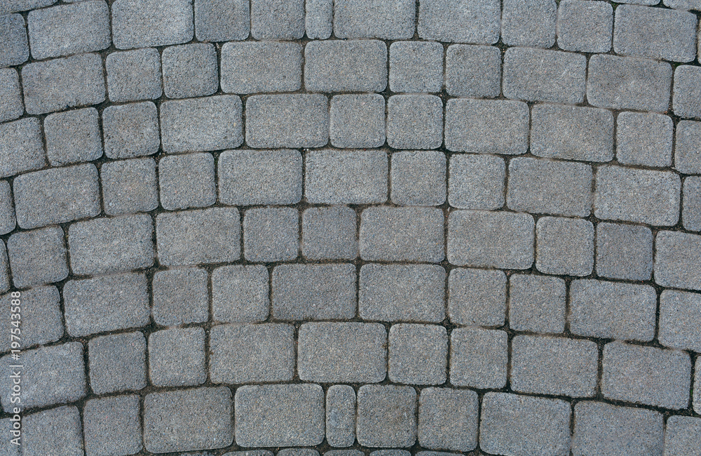 The texture of paving stone masonry, close up, top view. Exterior floor covering..Pavement background. The texture of paving stone masonry, close up, top view. Exterior floor covering..Pavement background.