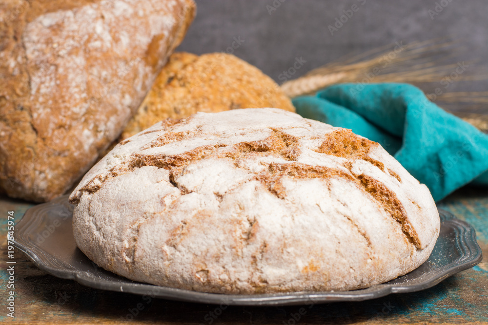 Farmers homemade organic wheat, barley and rye bread in assortment Farmers homemade organic wheat, barley and rye bread in assortment