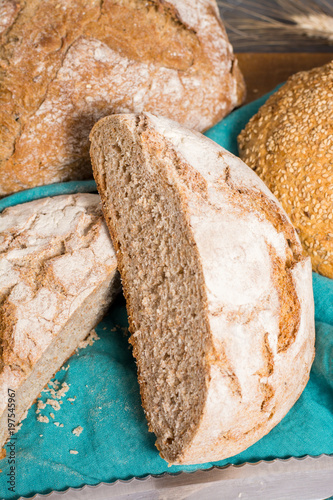 Farmers homemade organic wheat, barley and rye bread in assortment photo