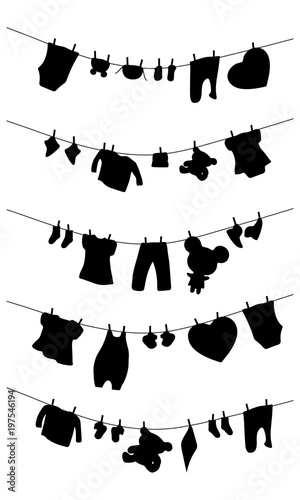 Silhouettes of baby clothes and toys on a romp