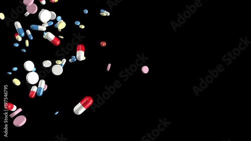 Pills and capsules falling. Loop section from 10:00 to 20:00, so the pills can fall for as long as you like. Copy space on right. With a luma matte (alpha channel). Medicine, medical, health. photo