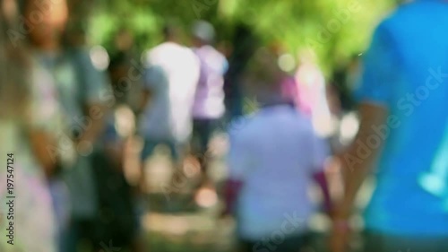 Wallpaper Mural Defocused colorful crowd in slow motion at a festival. Filmed out-of-focus, with a lens flare effect, so the people are unrecognizable. Torontodigital.ca